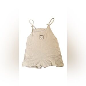 Cream One Piece Romper with Hawaiian quilt patch